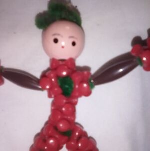 Handcrafted Beaded Doll Figurine - Red and Green
